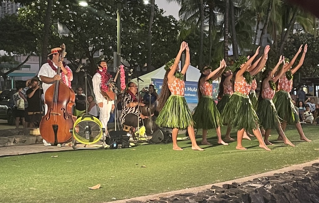 Dancers perform at the Kuhio Beach Hula Show in Honololu, Hawaii. Watching a hula is a fun and active way to learn Hawaiian. photo ©Kate Dana