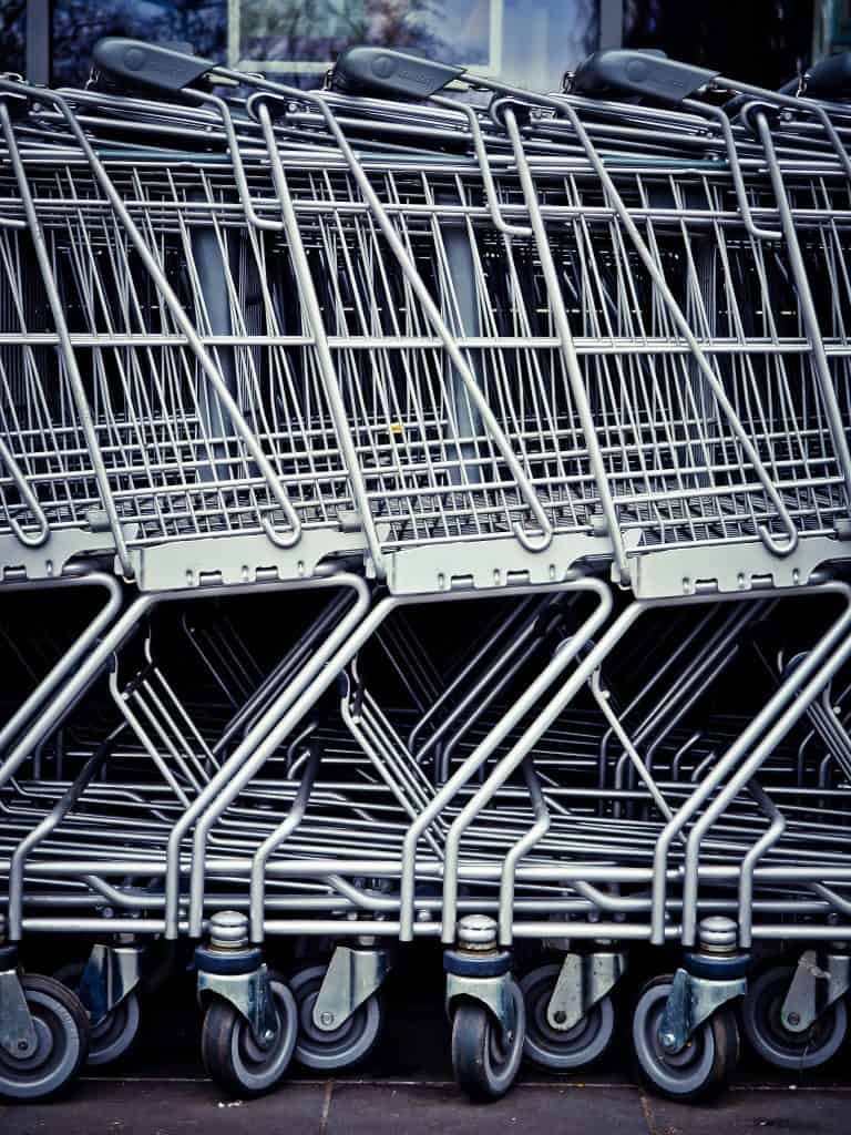 "Buggy: Several metal shopping carts line up together in this color, close-up photo for 78 Southern Phrases to Blow Your Hair Back, Cocameca.com photo ©Pexels-Pixabay