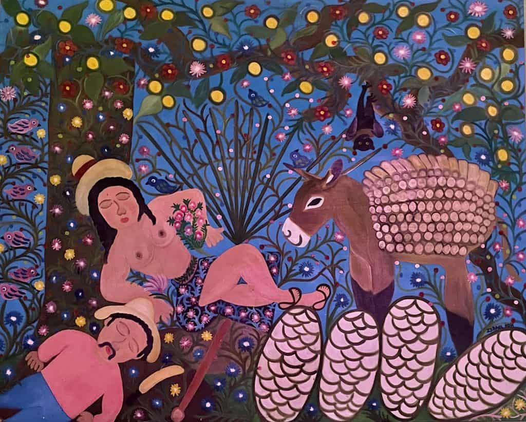 A colorful, folk art painting in blues, pinks, greens, and yellows shows two shirtless people wearing hats, relaxing against a tree next to a burro with agave cores in the foreground, photo ©Kate Dana