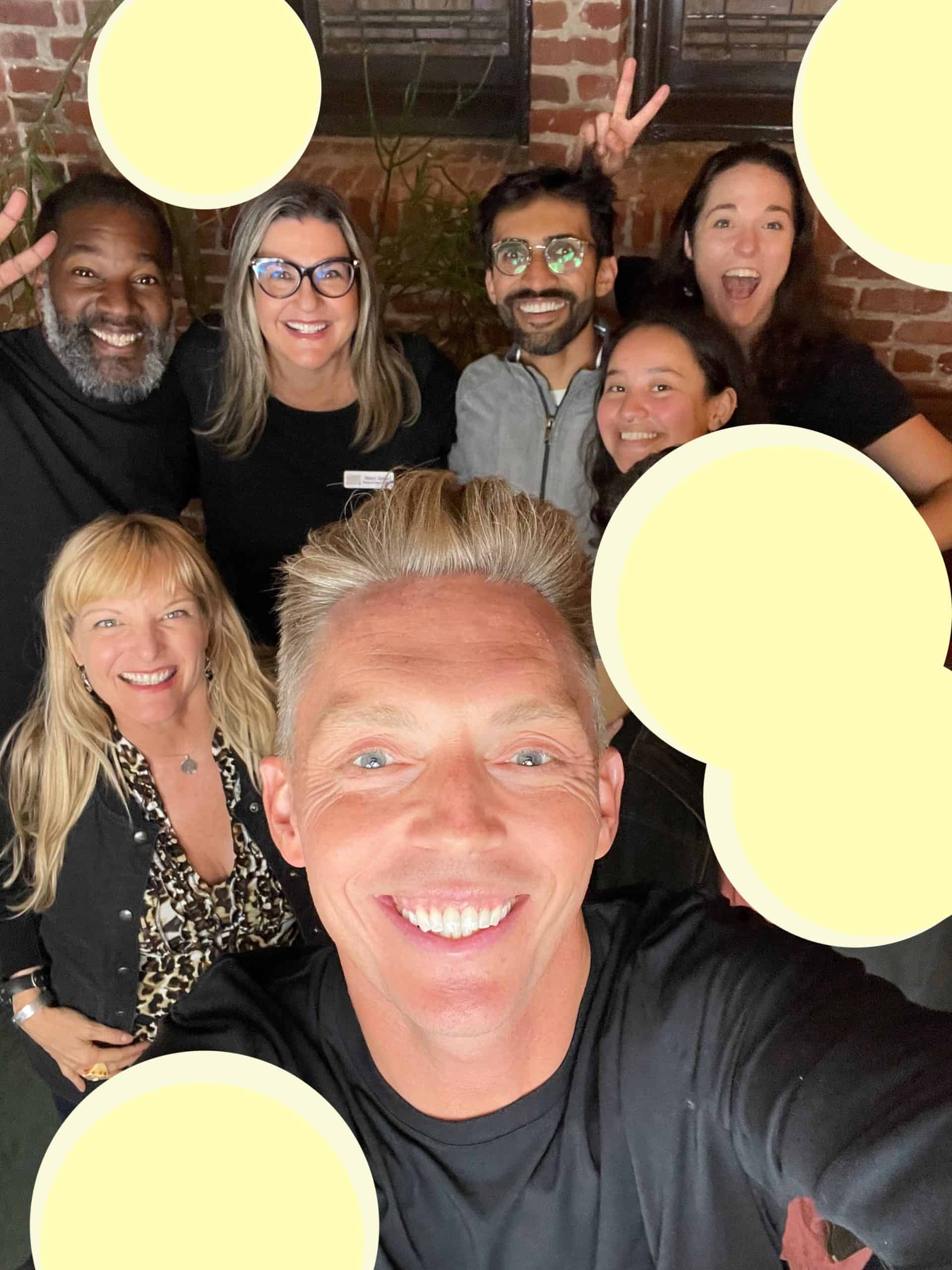 A selfie taken by Joshua Field Millburn of The Minimalists features Cocameca founder, Kate Dana, Minimalist co-host T.K. Coleman, Calvary Presbyterian Church minister Marci Glass, Malabama from The Minimalists, and audience members. Kevin and Hannah photo ©Kate Dana