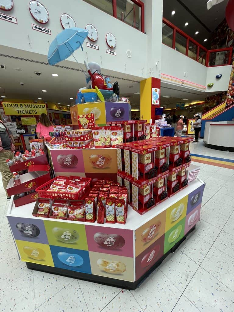 Shelves of colorful candies, clothing, dispensers, and other eclectic merchandise tempt visitors in the gift shop inside the Jelly Belly Factory in Fairfield, CA, photo ©Kate Dana