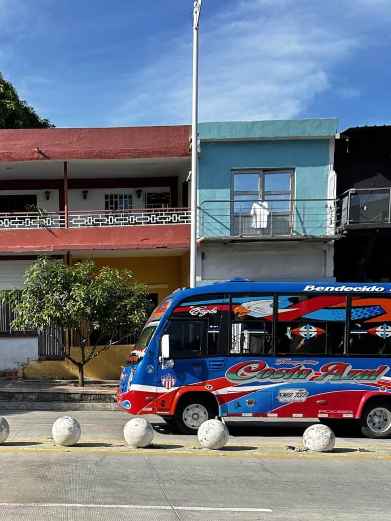 A colorful bus on a city street in Barrio Abajo, Barranquilla, Colombia, photo ©Kate Dana