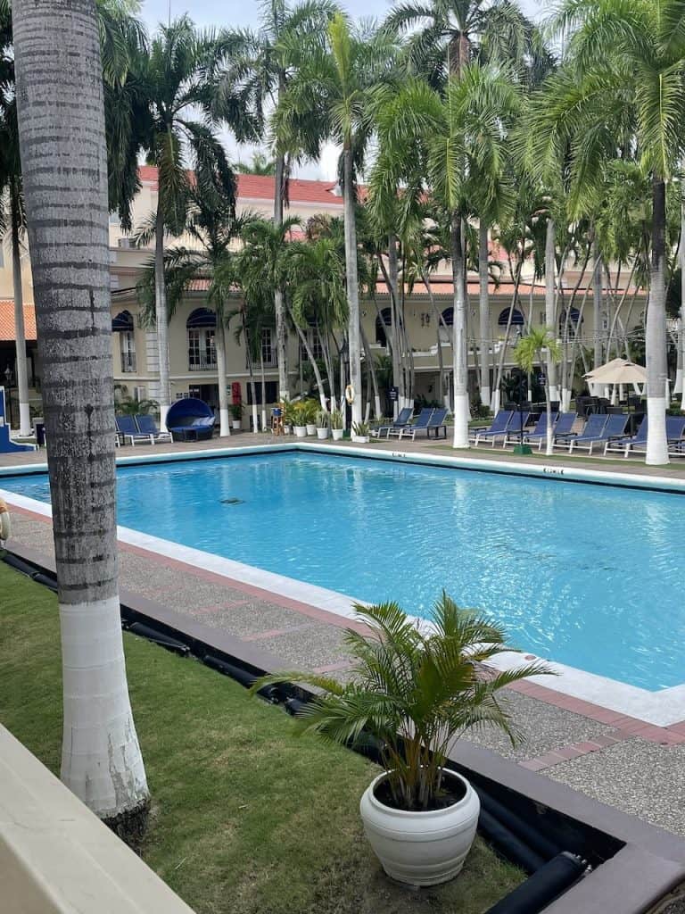 the shimmering pool with tropical plan landscape at Hotel el Prado in Barranquilla, Colombia ©Kate Dana