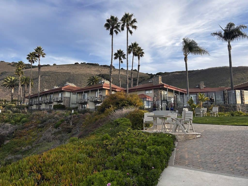 A view of the Inn at the Cove showing all rooms facing the ocean near Pismo Beach, California