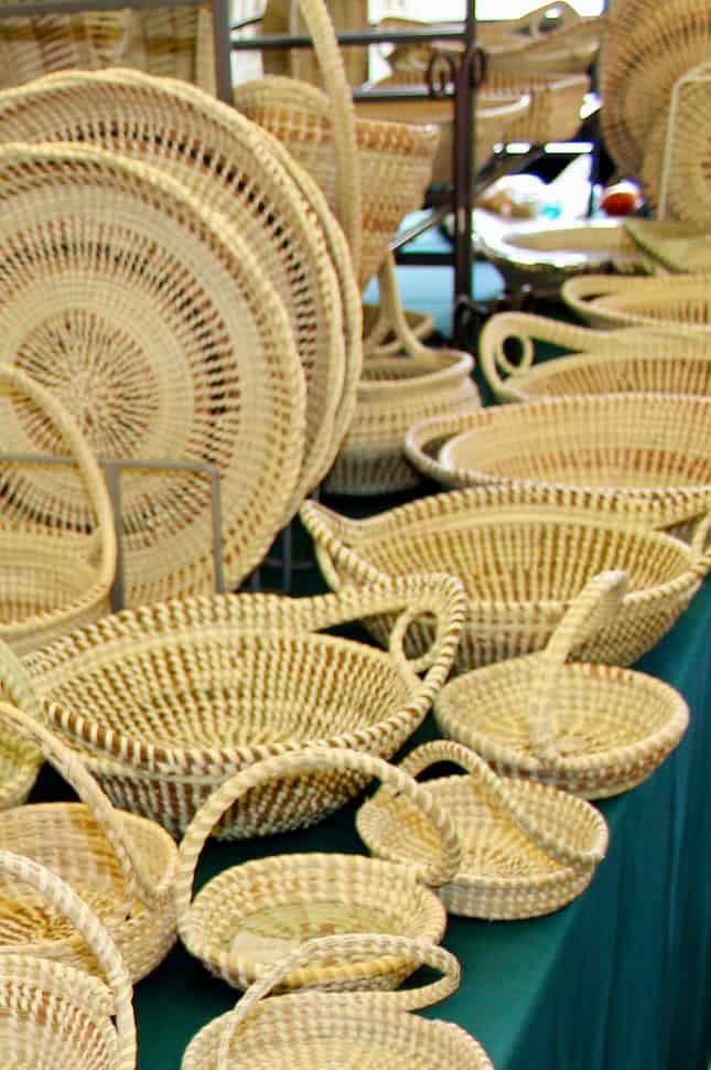 Handcrafted sweetgrass baskets displayed on a table near Charleston, S.C., photo ©Wally Gobetz for Flickr