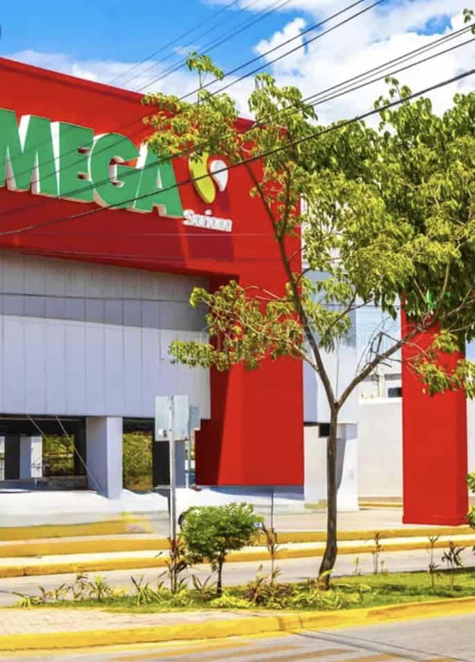 The red storefront of a Mega Soriana supermercado in Isla Cozumel, Mexico, photo ©Kate Dana