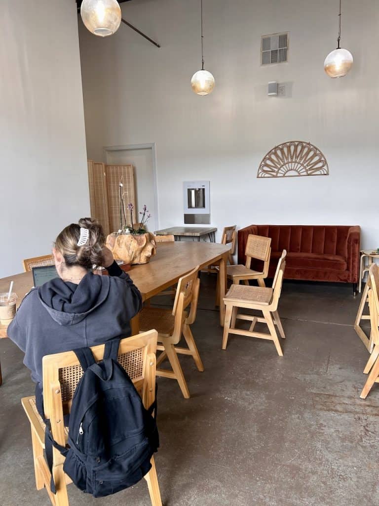 A cozy cafe setting at Honeylux coffee inside The Hangar in Watsonville, CA, photo ©Kate Dana