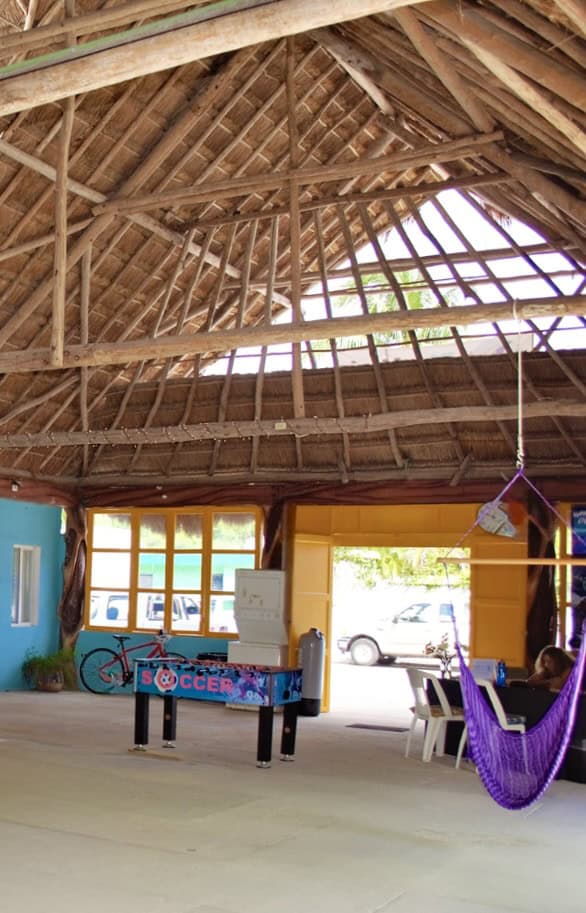 The inside view of a thatched roof at Blue Magic Hostel in Isla Cozumel, Mexico, photo ©Kate Dana