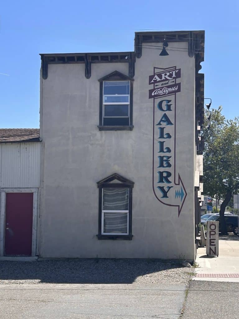 A hand painted wall sign announces the Alamo Gallery, photo ©Kate Dana