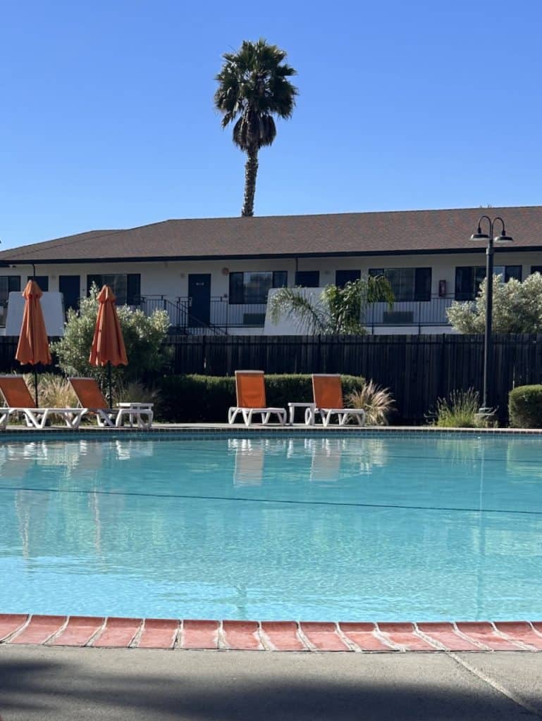 A view of the beautiful blue swimming pool at the Sandman hotel in Santa Rosa, California, photo ©Kate Dana
